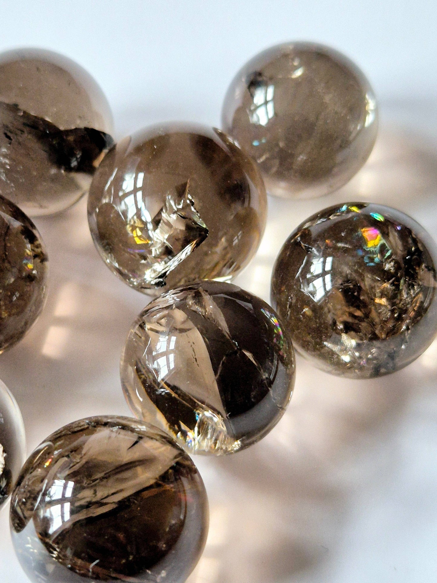 RAUCHQUARZKUGELN MIT REGENBOGEN, A+QUALITÄT 2,5 CM