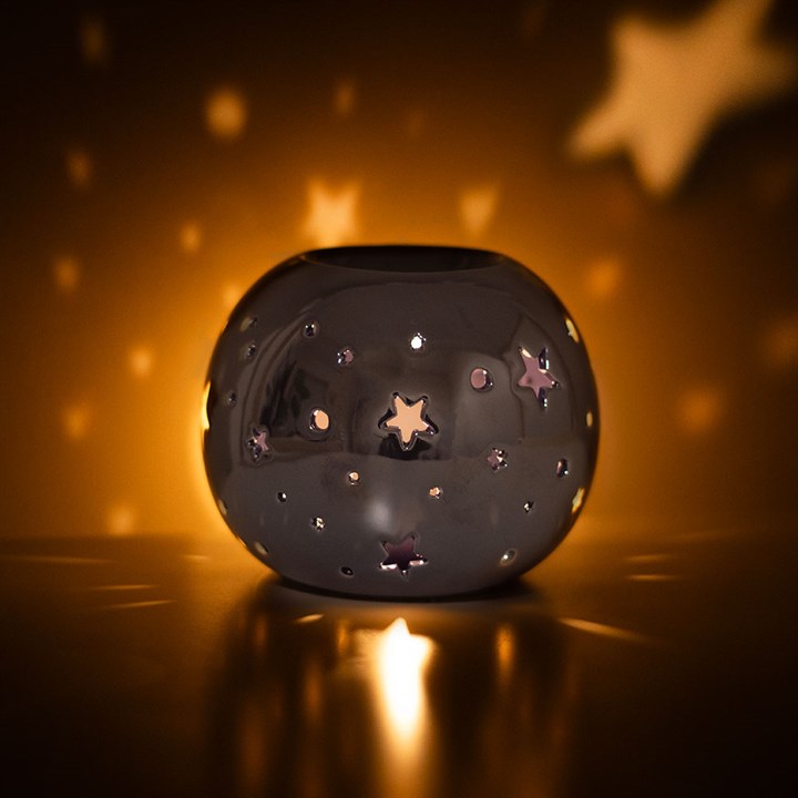 IRIDESCENT STAR ÖLLAMPE UND WACHSWÄRMER